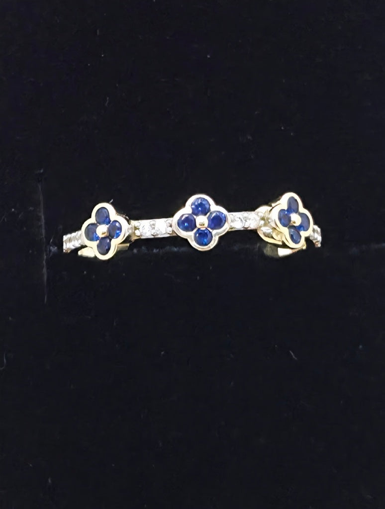 10KT BLUE CZ SMALL FLOWERS RING Size 8.5 Weight 1.2GR