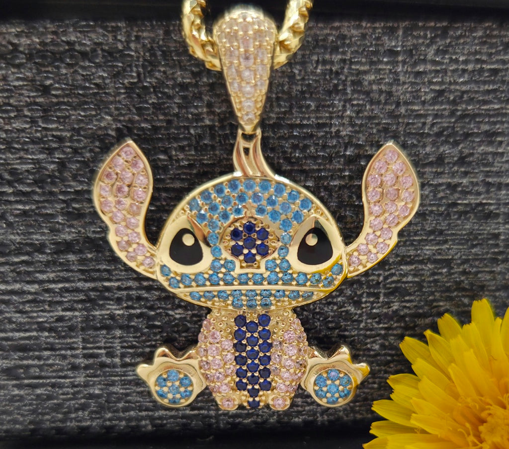 10KT BLUE CZ STITCH PENDANT Weight 4.4GR