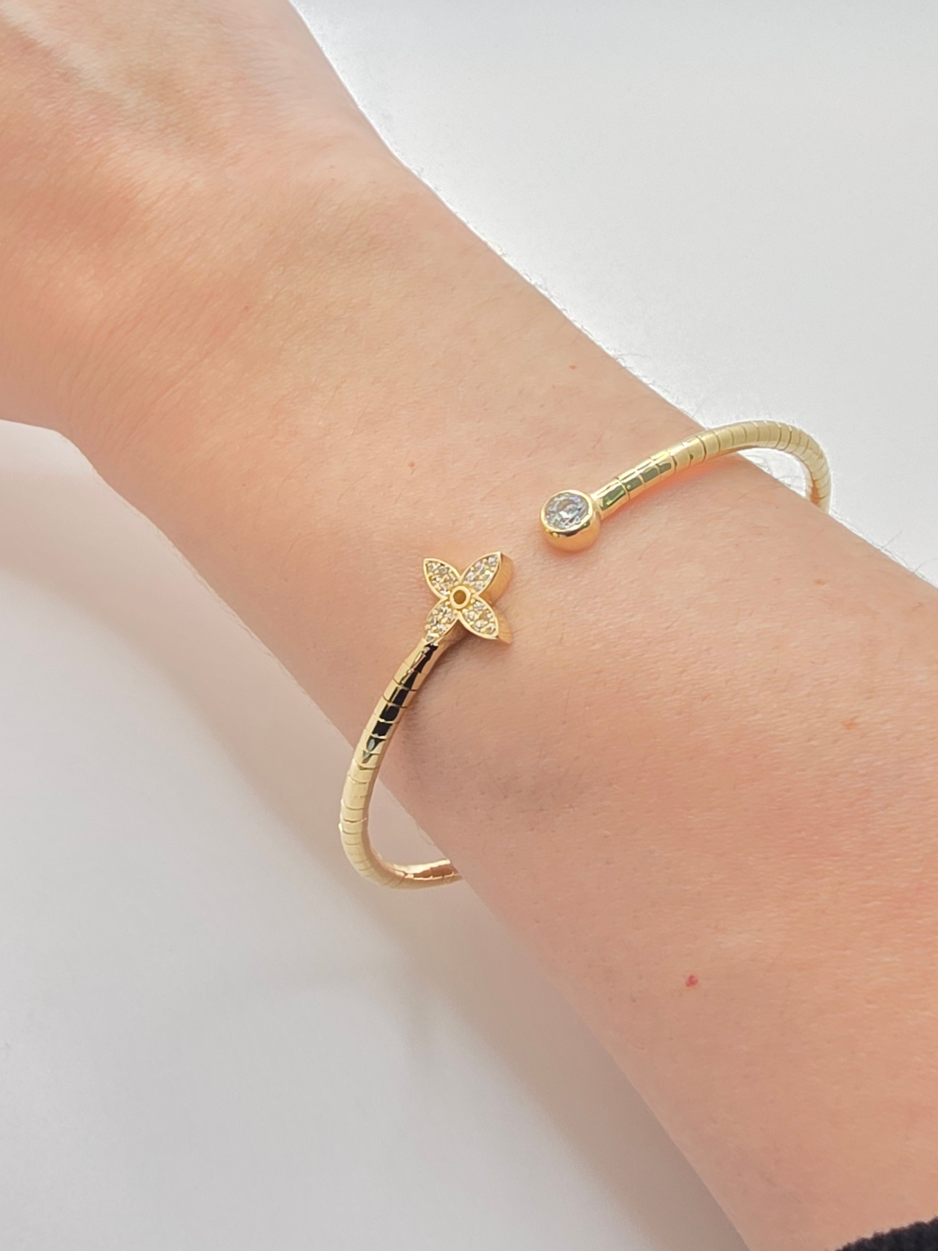 14KT FLEXIBLE CZ FLOWER BANGLE Size 3MM Weight 8.5GR