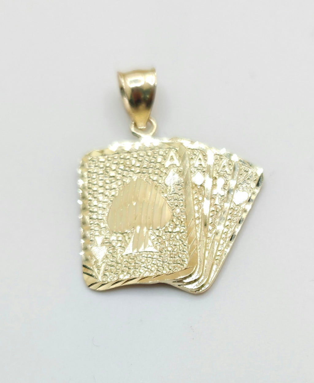 10KT GOLDEN POKER PENDANT Weight 5GR