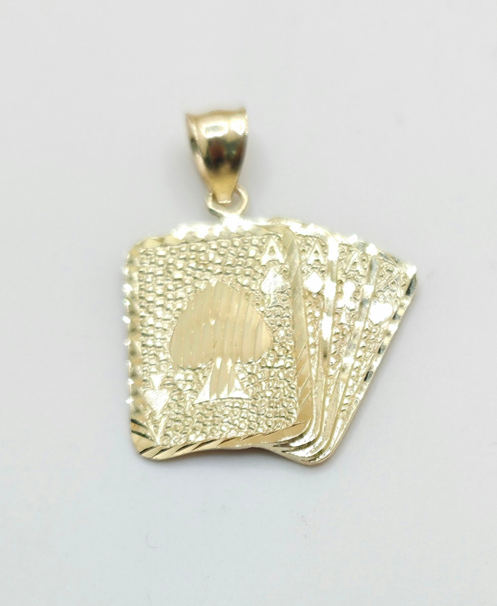 10KT GOLDEN POKER PENDANT Weight 5GR