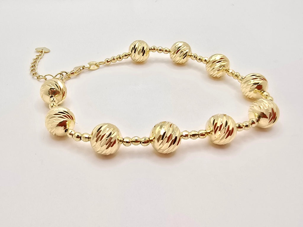10KT YELLOW GOLD LARGE BEAD DIAMOND CUT BRACELET Size 7INCH Weight 7.8GR