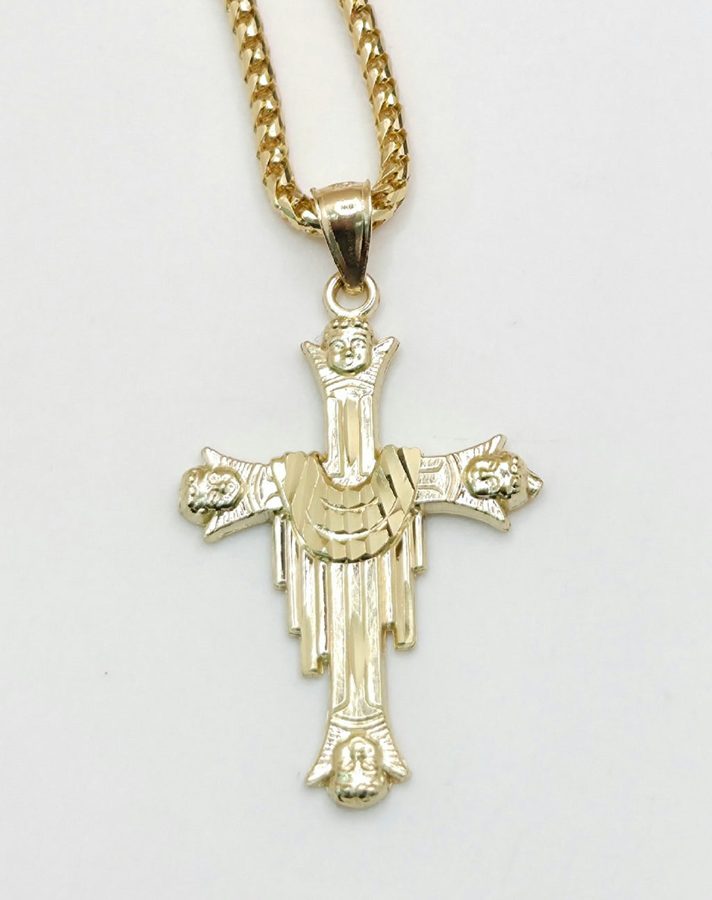 10KT CROSS WITH ROBE  PENDANT Weight 2.2GR