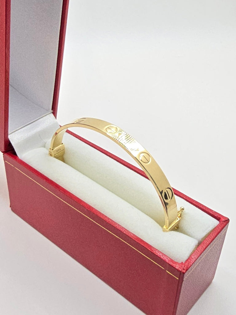 10KT YELLOW GOLD CARTI BANGLE Size 6MM Weight 8.6GR