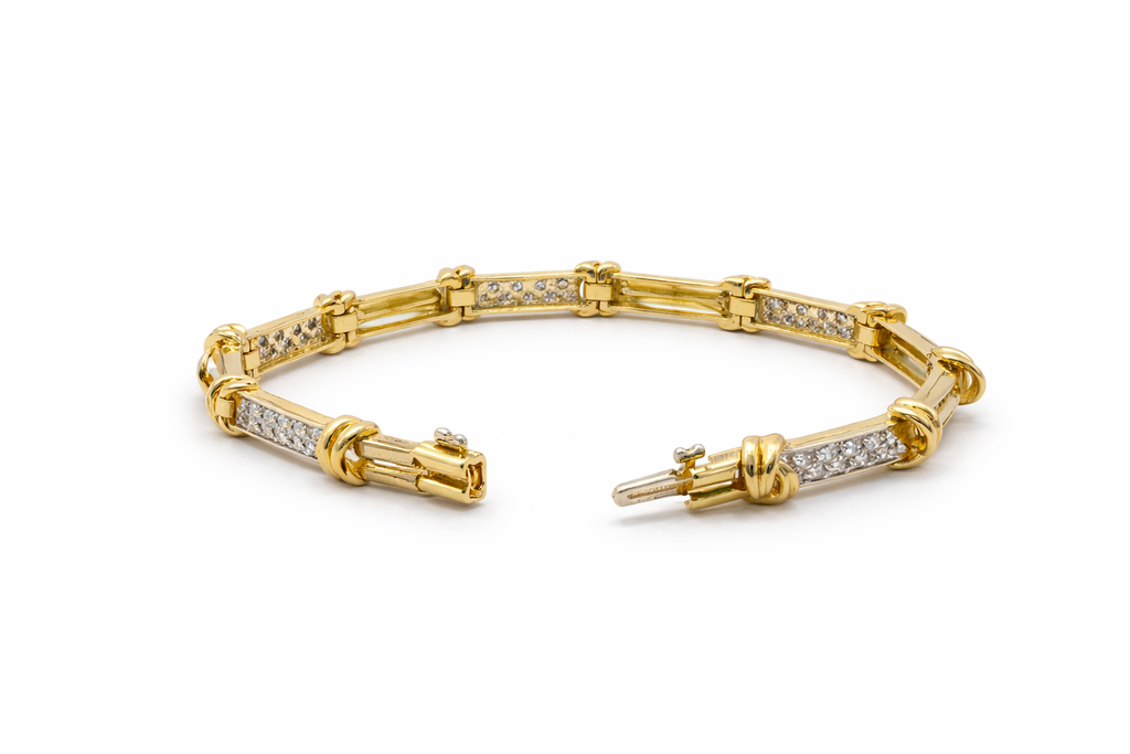 14KT ELEGANT KNOT DETAILS YELLOW GOLD AND DIAMOND WOMAN'S BRACELET Size 7INCH Weight 18.8GR