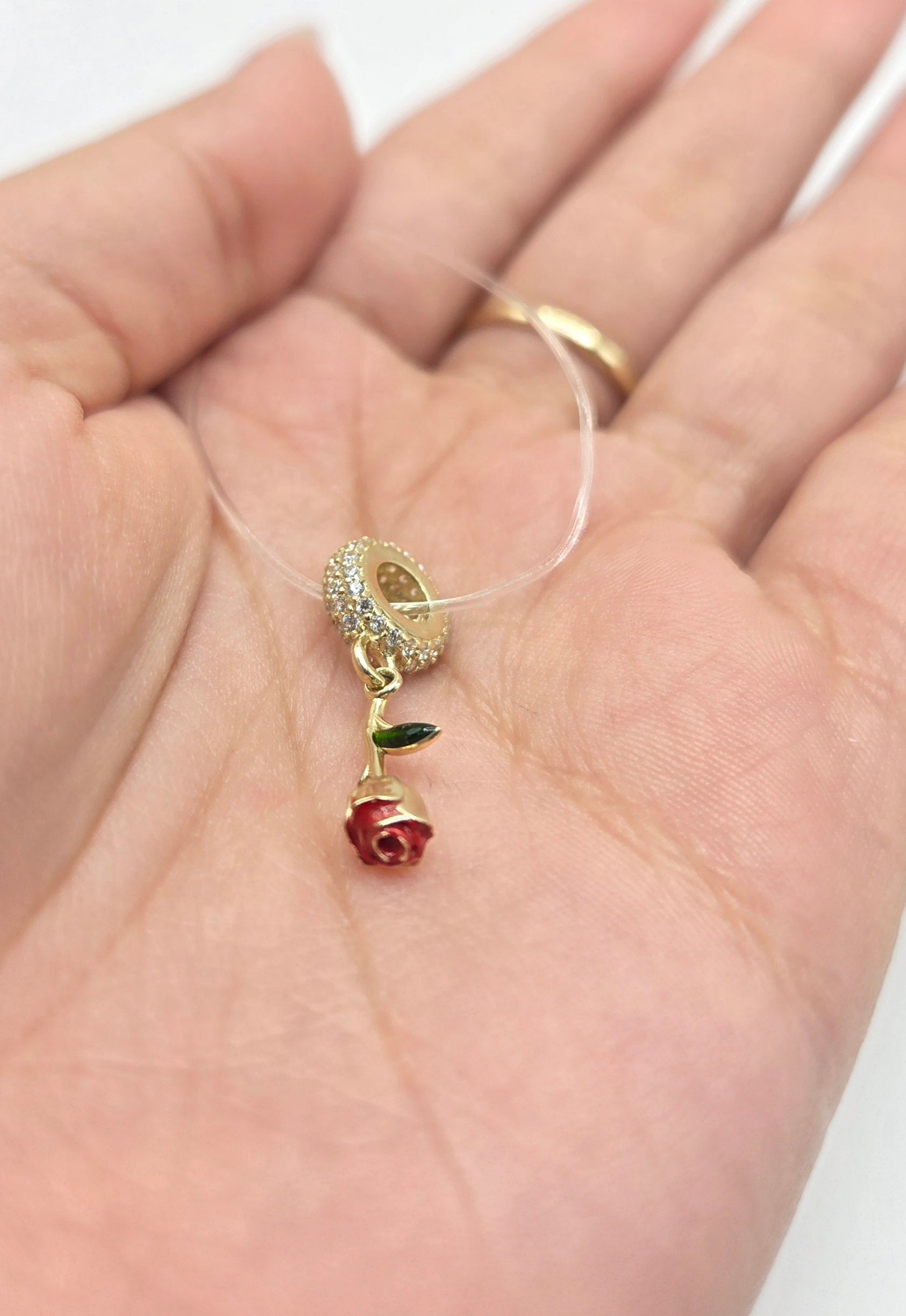 10KT DELICATE ROSE CHARM Size  Weigth 1.5GR