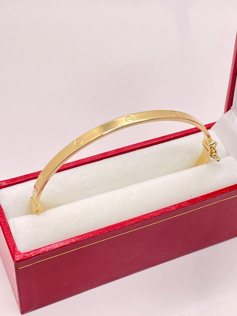 14KT YELLOW GOLD CARTI BANGLE Size 4MM Weight 5GR