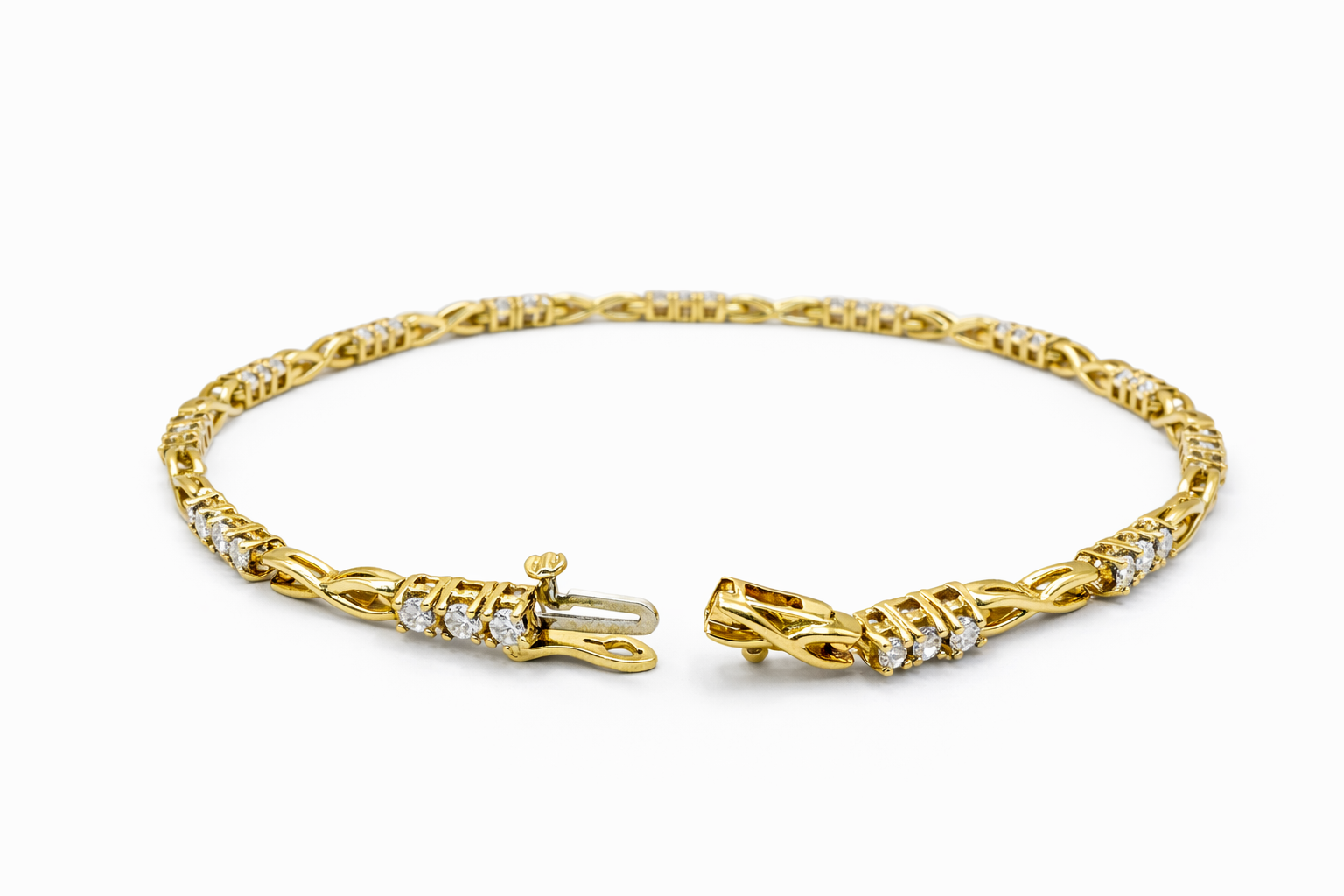 14KT ELEGANT X DESIGN DIAMOND WOMAN'S BRACELET Size 7INCH Weight 10.4GR