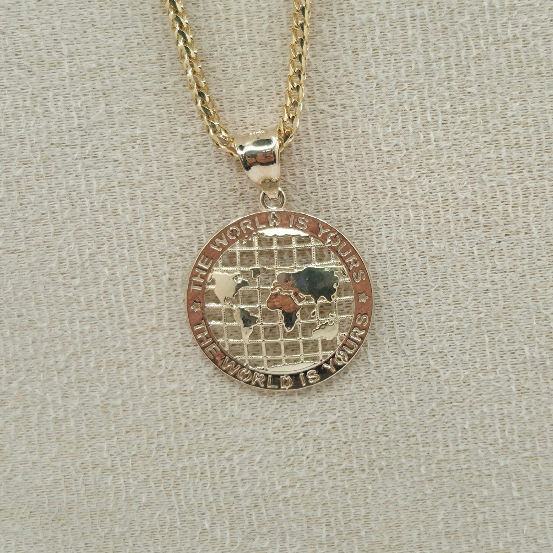 10KT EXTRA SMALL THE WORLD IS YOURS GLOBE PENDANT Weight 1.5GR