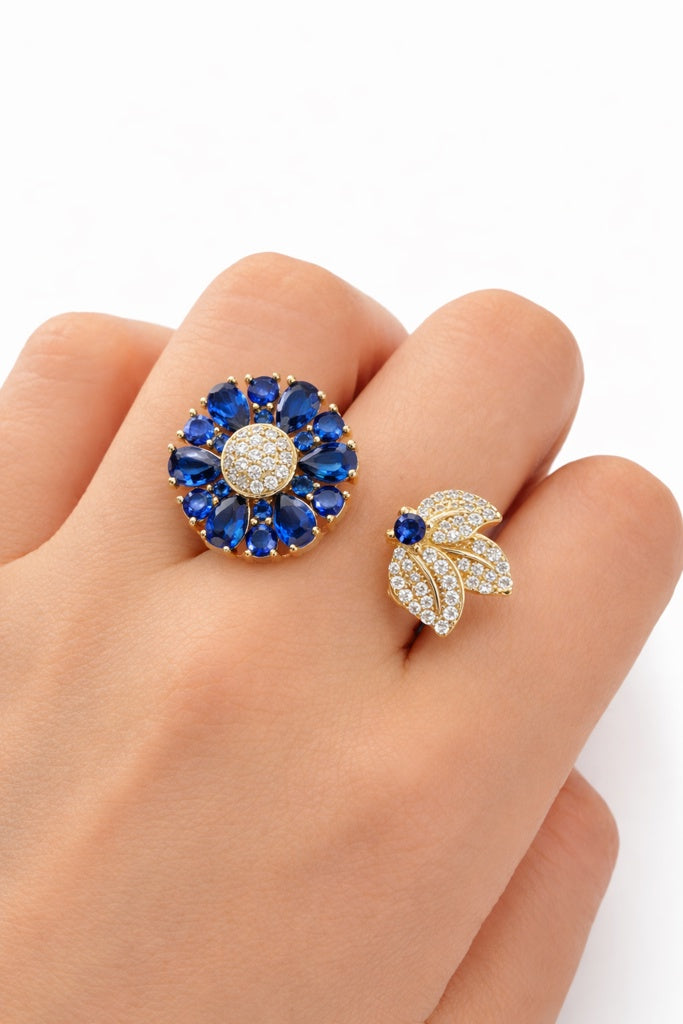 10KT BLUE STONE CZ DETAIL FLOWER RING  Size 7 Weight 5.2GR