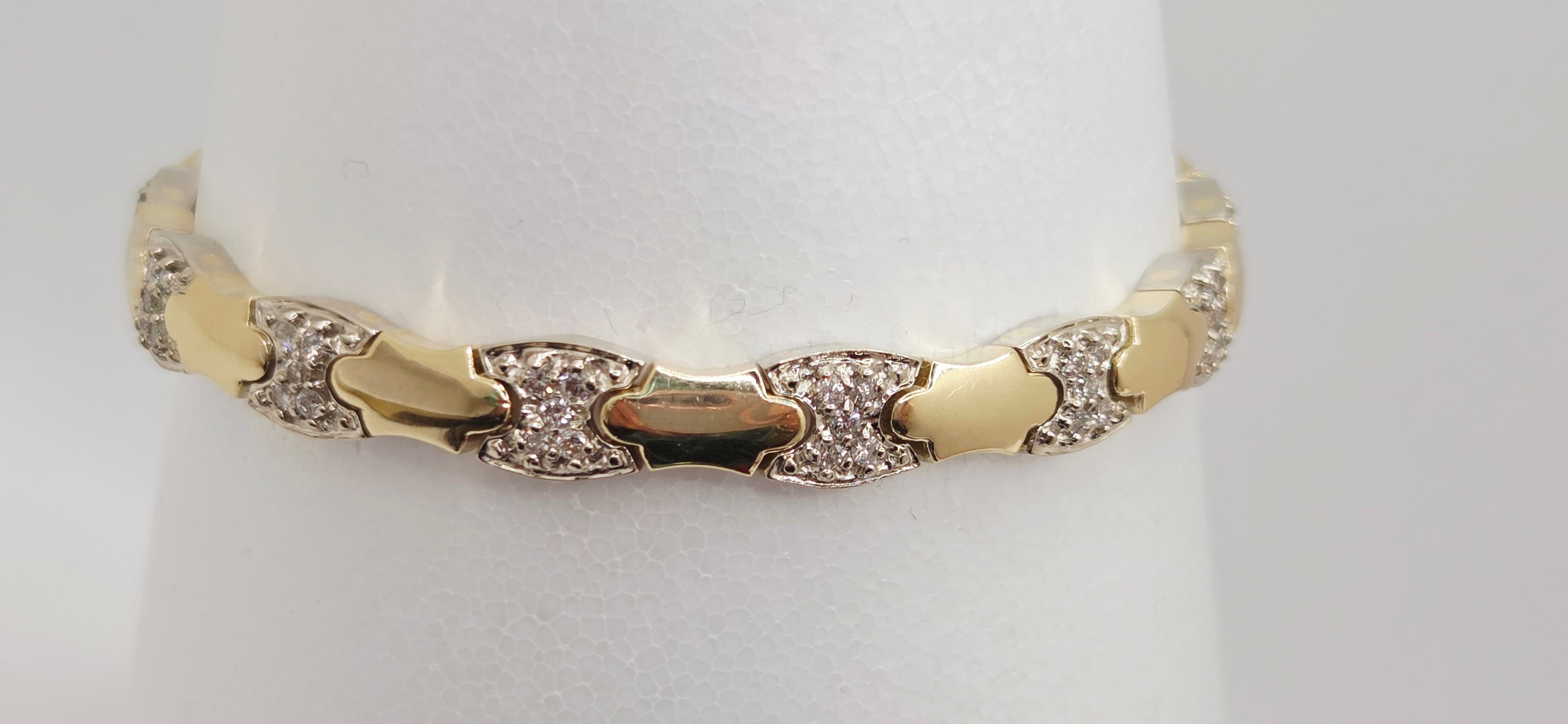 14KT YELLOW GOLD XOXO DIAMOND BRACELET Size 7MM 7INCH Weight 17.8 GRS