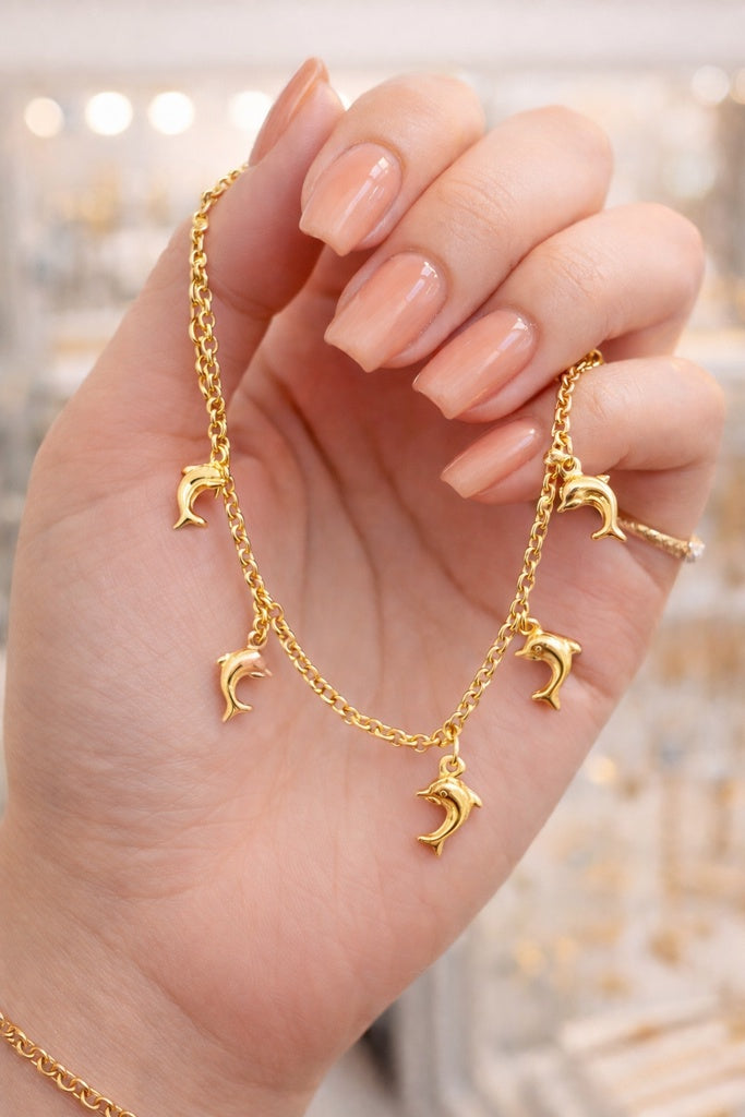 14KT DELICATE DOLPHINS PENDANTS BRACELET  Size 7INCH Weight 4GR