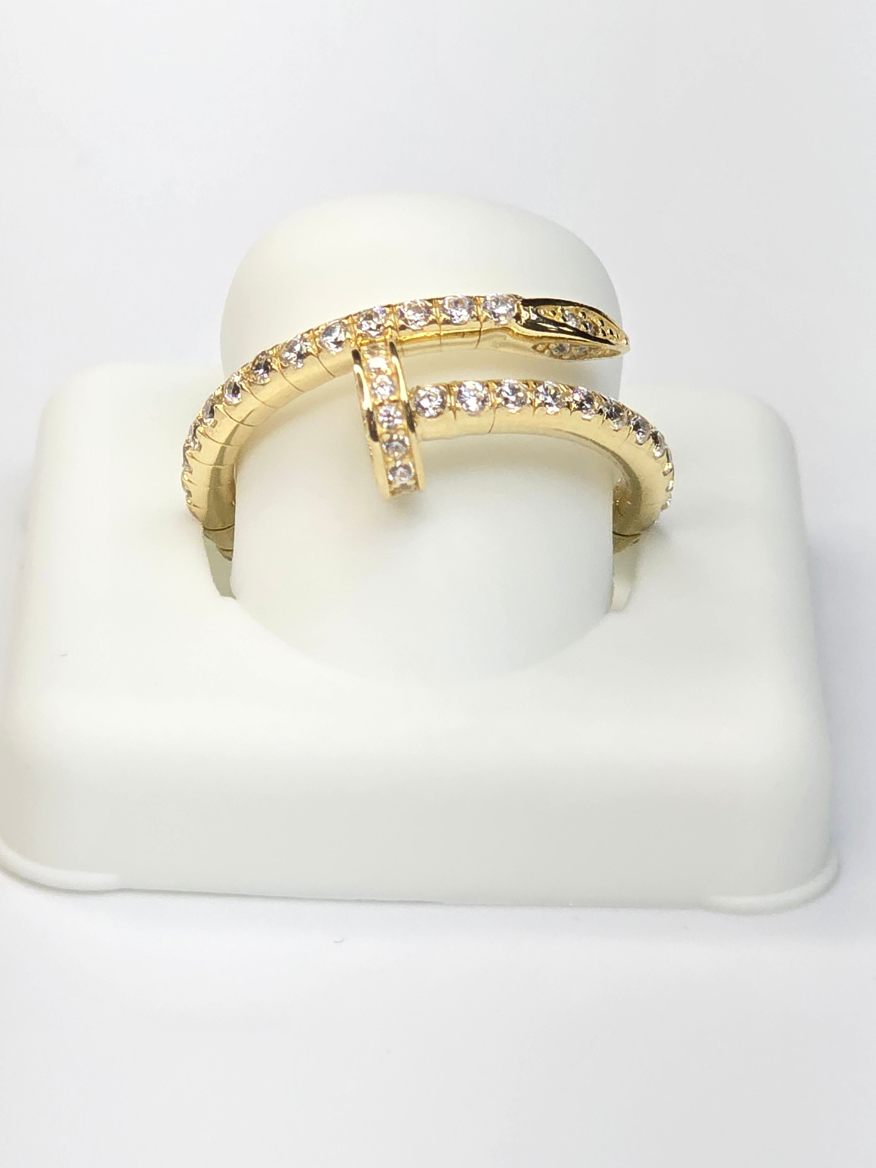 14KT CZ FLEXIBLE NAIL RING Size 7 Weigth 2.8GR