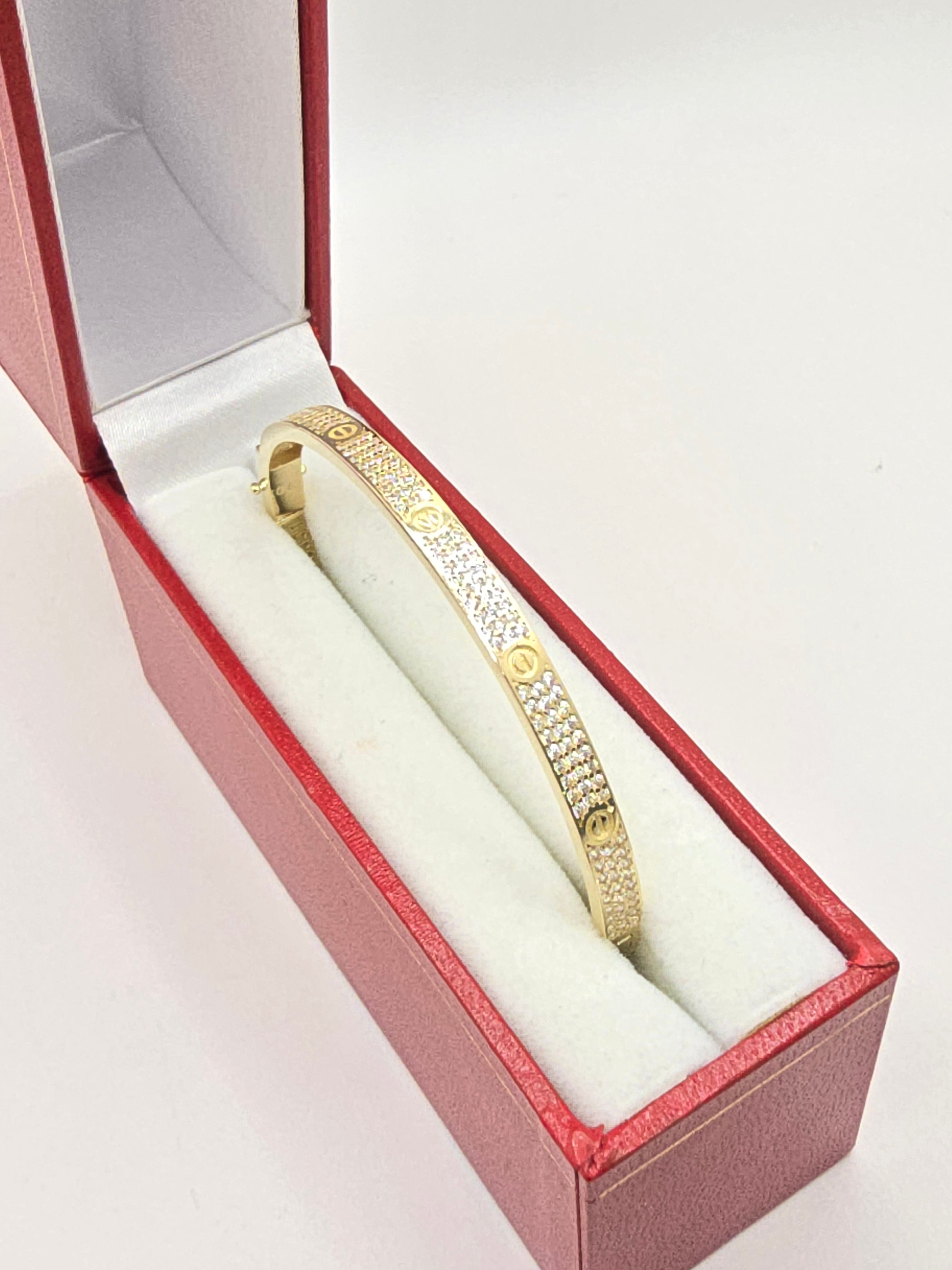 10KT YELLOW GOLD CARTI BANGLE WITH ZIRCONIA  Size 4.5MM Weight 8.2GR