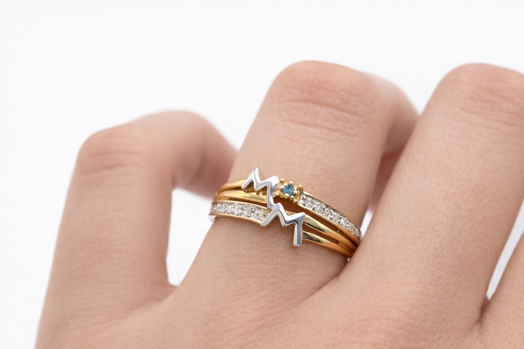 10KT DELICATE "M" AND "M" DIAMOND DETAIL RING Size 7 Weight 2.4GR