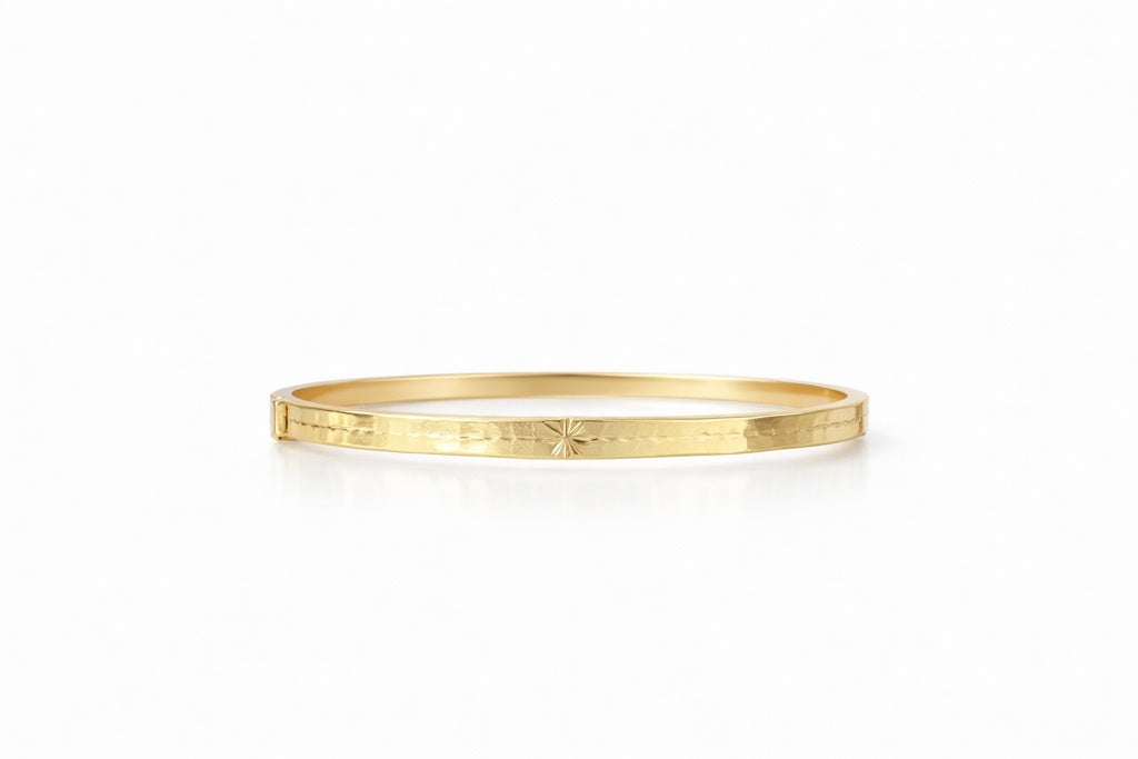 10KT  PLAIN WITH SMALL  ASTERISK DETAIL BANGLE Weight 6.7GR