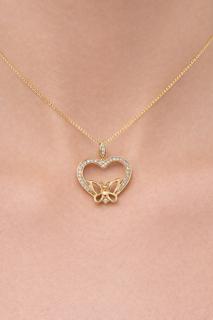 10KT DIAMOND HEART WITH BUTTERFLY PENDANT Weigth 2.1GR