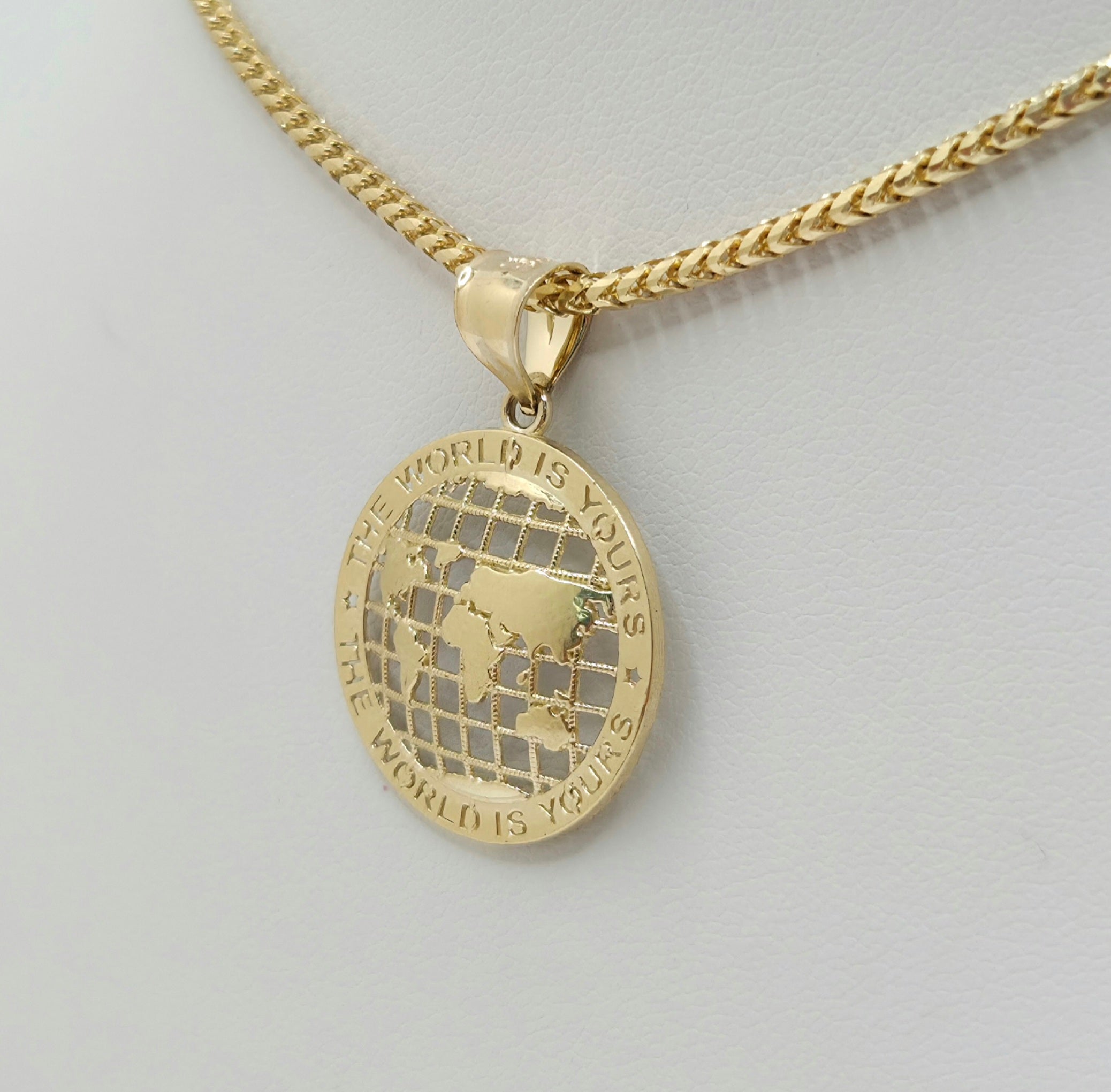 10KT EXTRA SMALL THE WORLD IS YOURS GLOBE PENDANT Weight 1.5GR