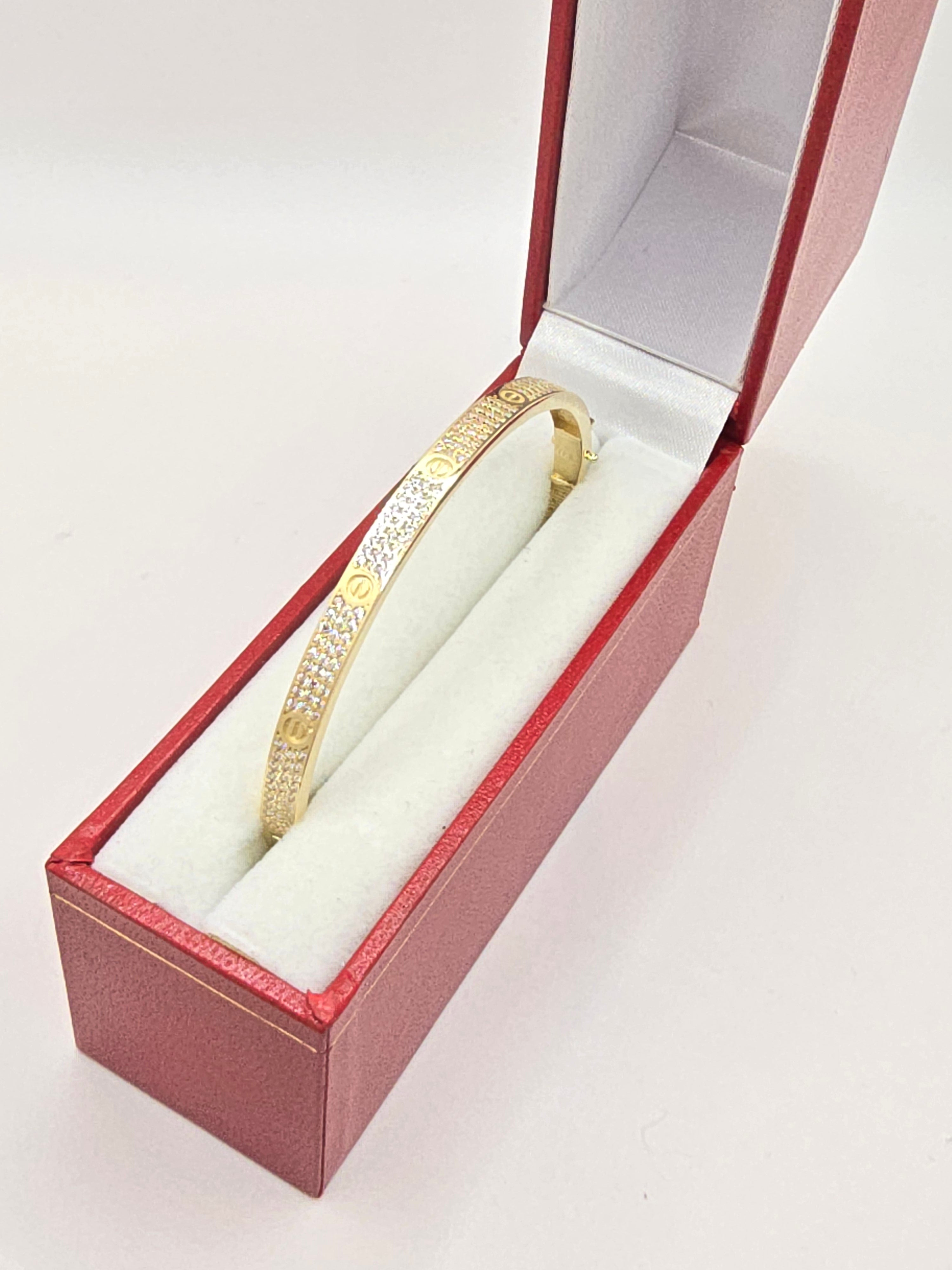 10KT YELLOW GOLD CARTI BANGLE WITH ZIRCONIA  Size 4.5MM Weight 8.2GR