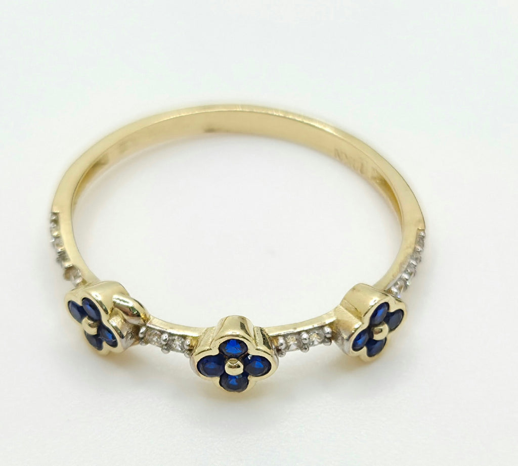 10KT BLUE CZ SMALL FLOWERS RING Size 8.5 Weight 1.2GR