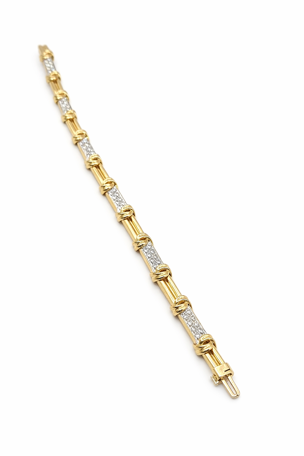 14KT ELEGANT KNOT DETAILS YELLOW GOLD AND DIAMOND WOMAN'S BRACELET Size 7INCH Weight 18.8GR