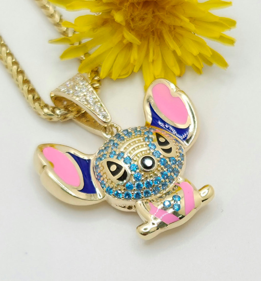 10KT CZ SKY BLUE STITCH PENDANT Weight 3.8GR