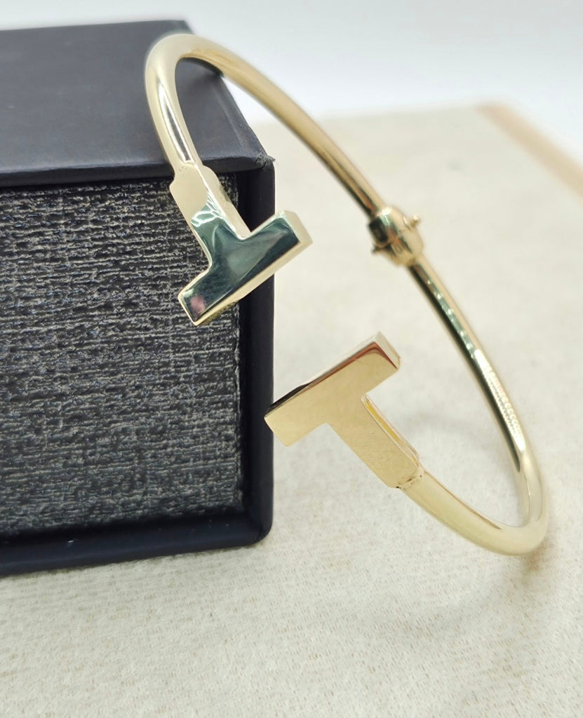 10KT YELLOW GOLD TT DESIGN BANGLE Size 18 Weight 6.9GR