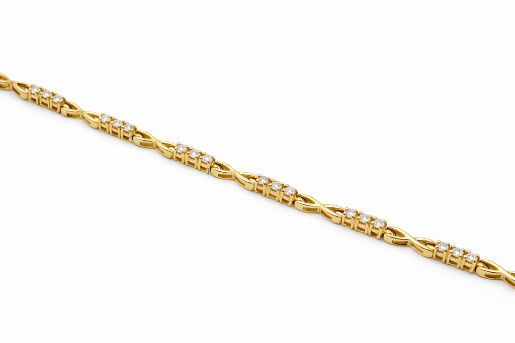 14KT ELEGANT X DESIGN DIAMOND WOMAN'S BRACELET Size 7INCH Weight 10.4GR