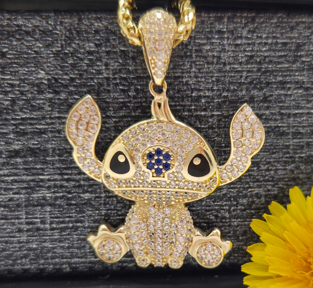 10KT WHITE CZ STITCH PENDANT Weight 4.4GR