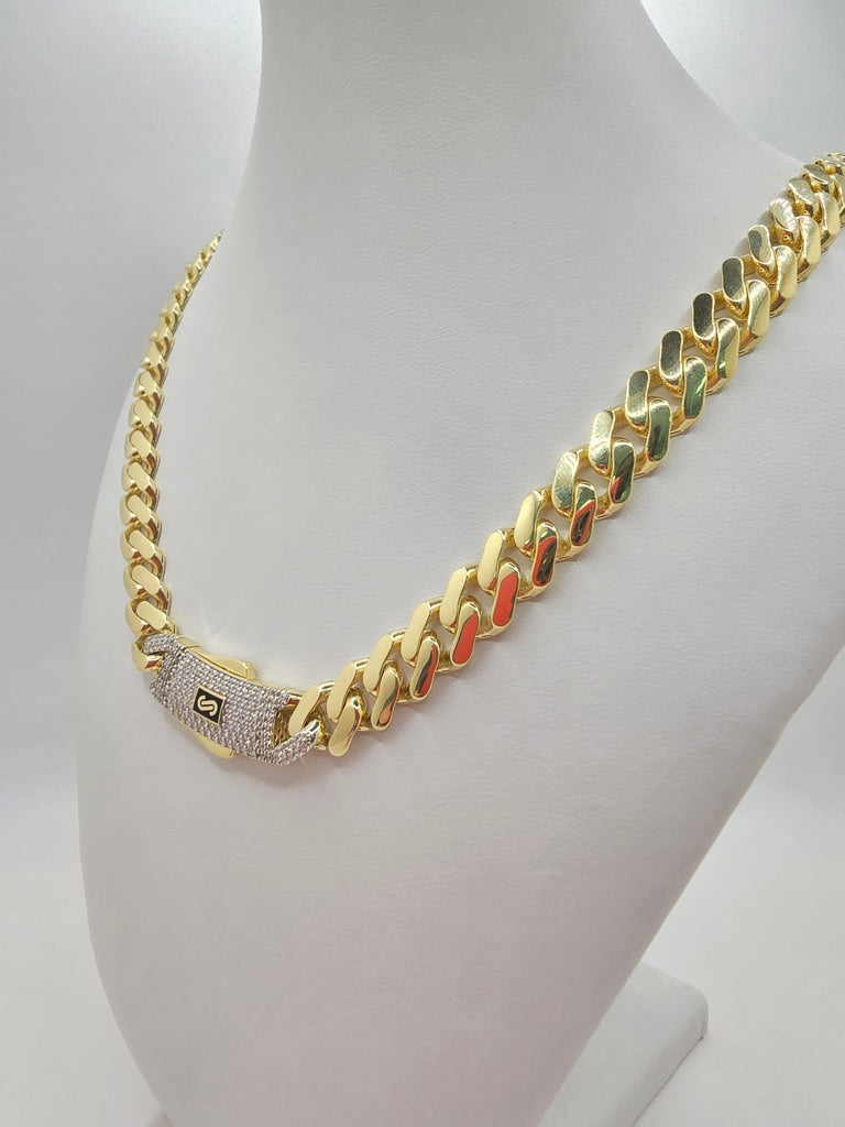 10KT CZ LOCK CERTIFIED MONACO CHAIN 9.5MM 22IN 26.8GRS
