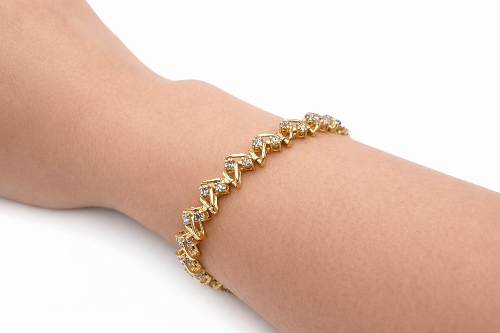 14KT YELLOW GOLD ROUND DIAMONDS ZIGSAG BRACELET Size 8MM 7INCH Weight 14.3 GRS
