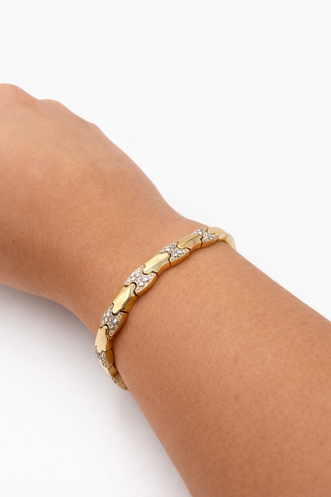 14KT YELLOW GOLD XOXO DIAMOND BRACELET Size 7MM 7INCH Weight 17.8 GRS