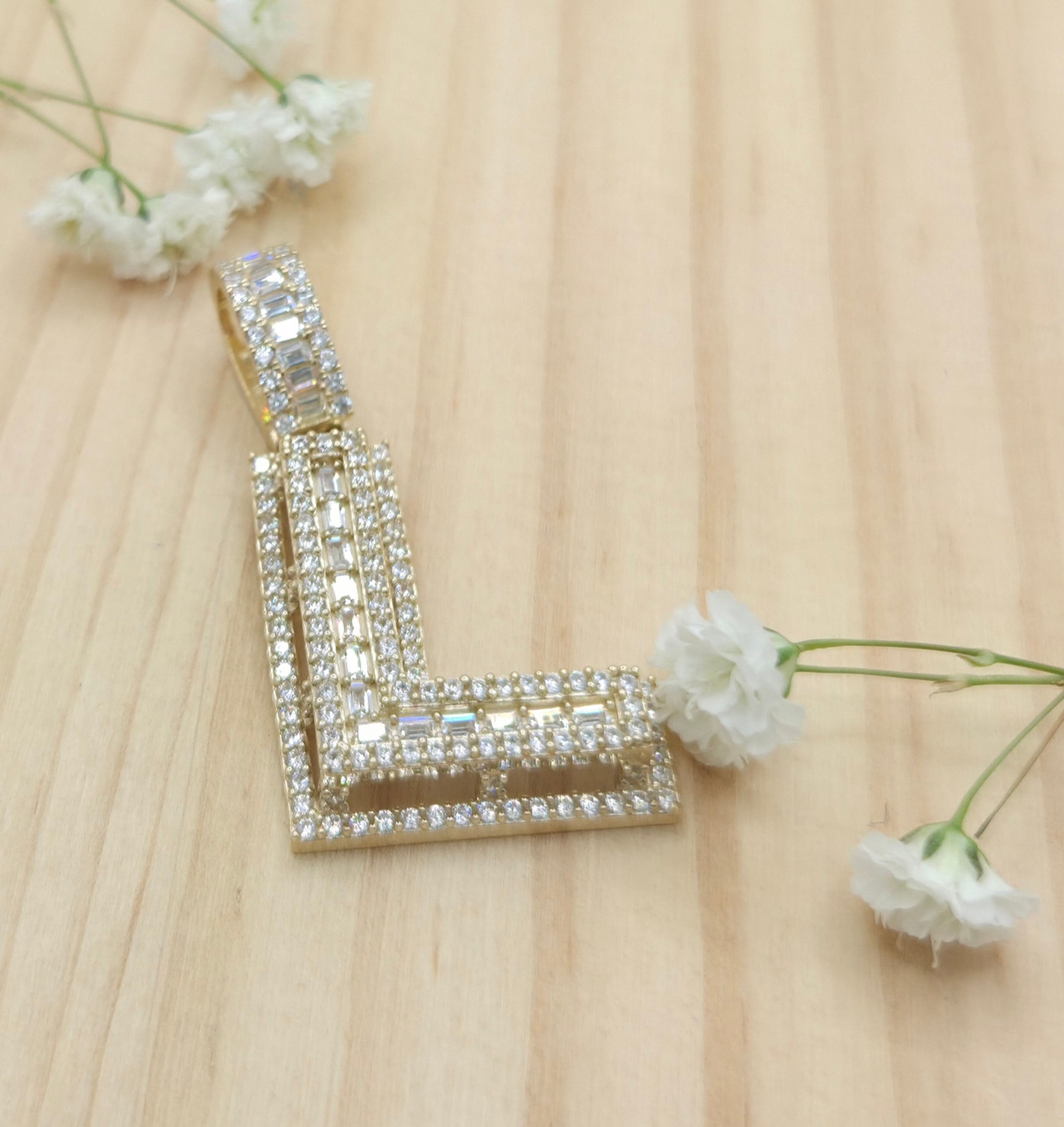 10KT SMALL CZ "L" LETTER PENDANT Weight 3.8GR