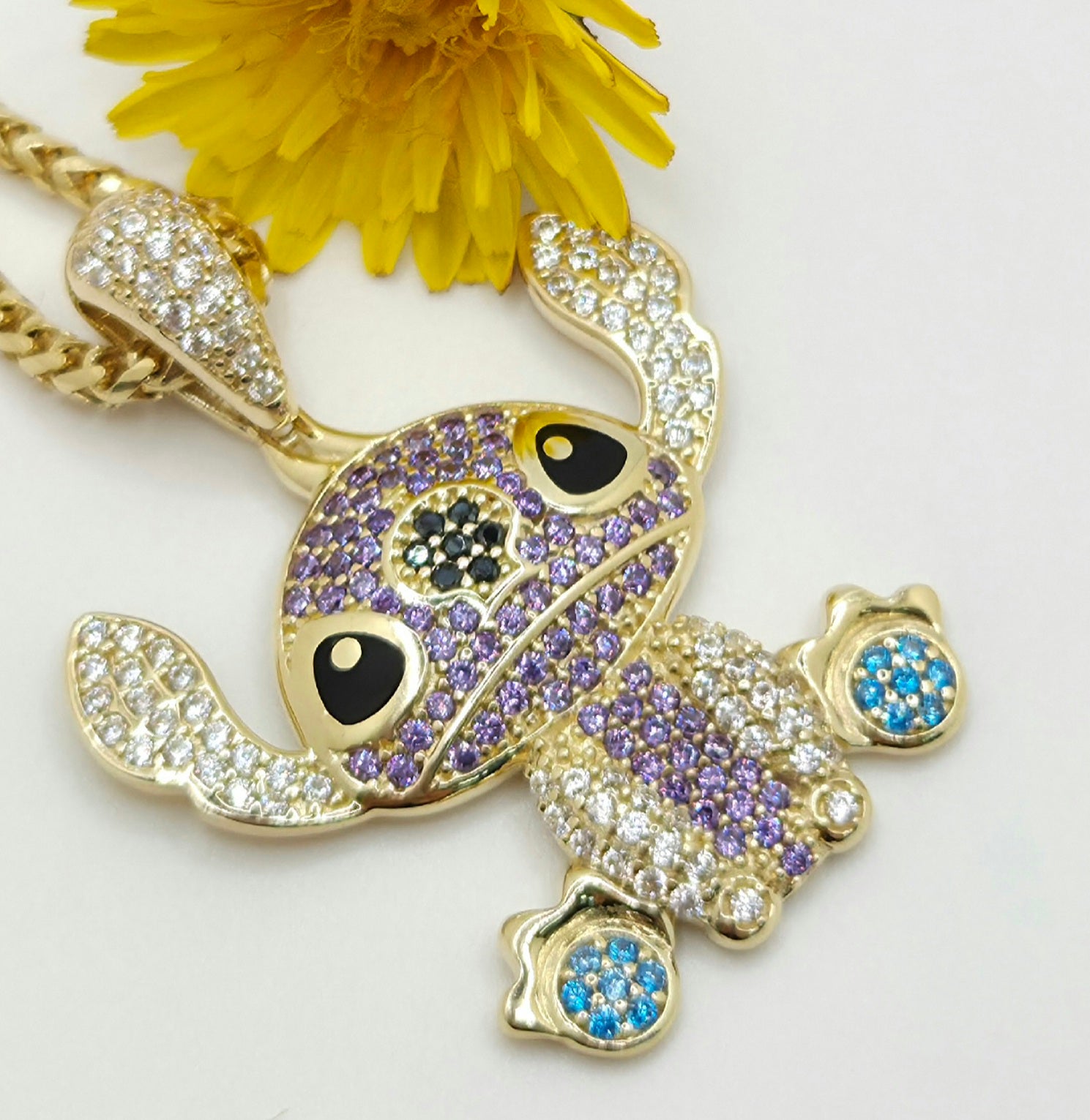 10KT PURPLE CZ STITCH PENDANT Weight 4.4GR