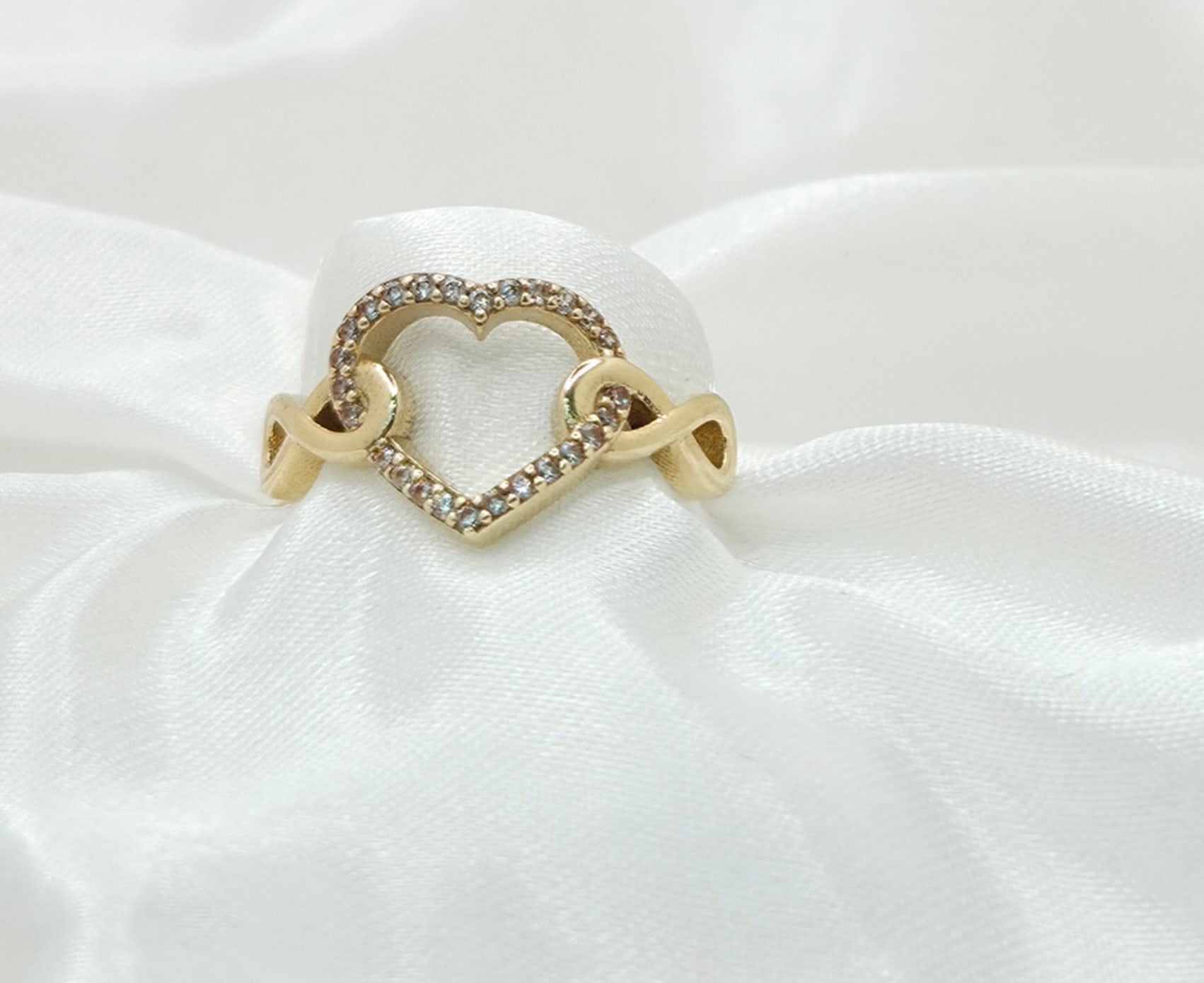 10KT TWO INFINITY WITH HEART RING Size 7 Weight 2.1GR