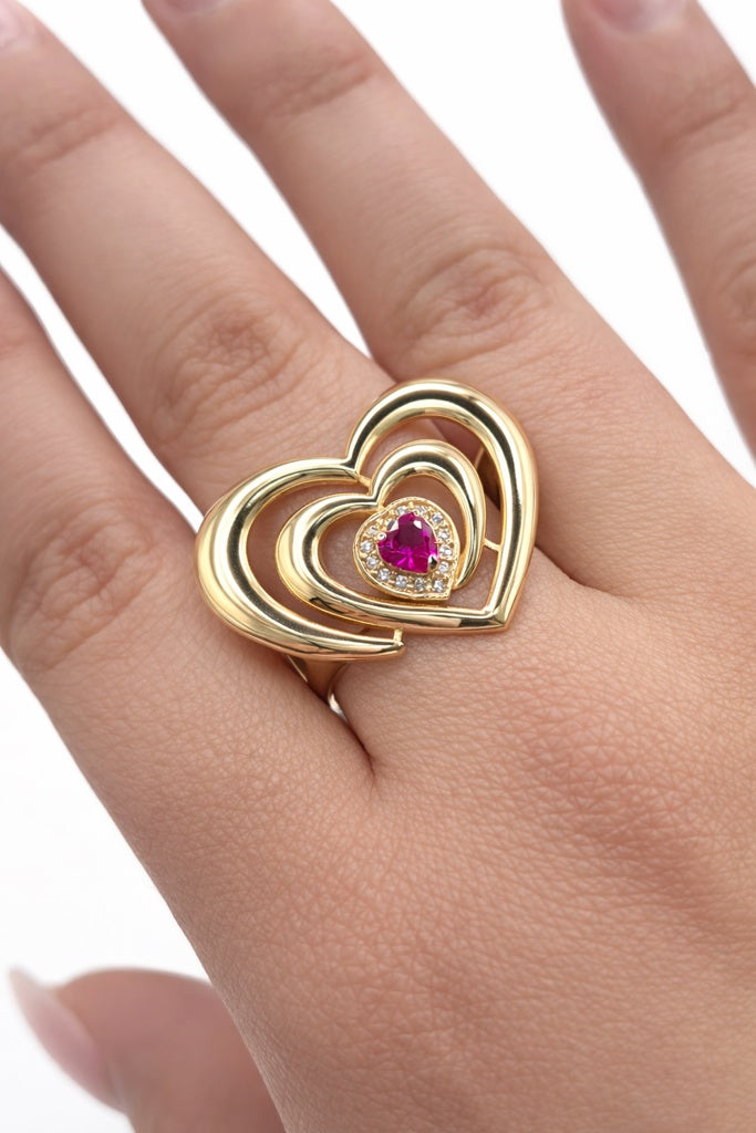 14KT EXOTIC RING WITH A LARGE HEART AND A PINK STONE Size 9 Weight 3.9GR