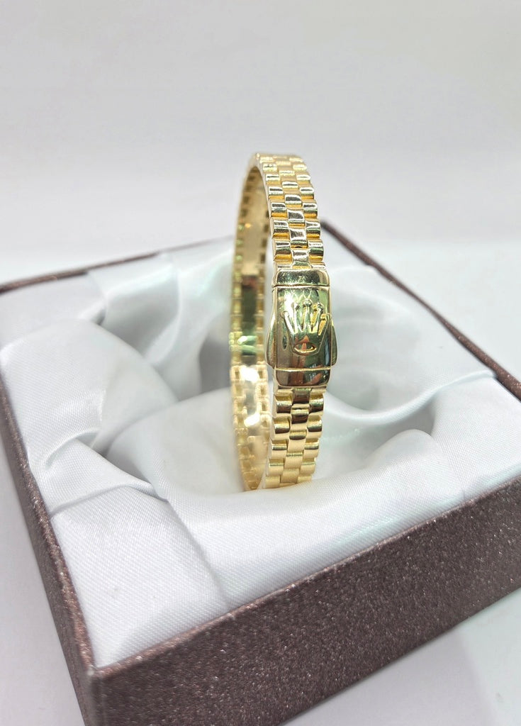 10KT 10KT WATCH BRACELET STYLE FLEXIBLE BANGLE WITH CROWN DETAIL Size 8MM Weigth 11.2GR Size 8MM Weigth 11.2GR