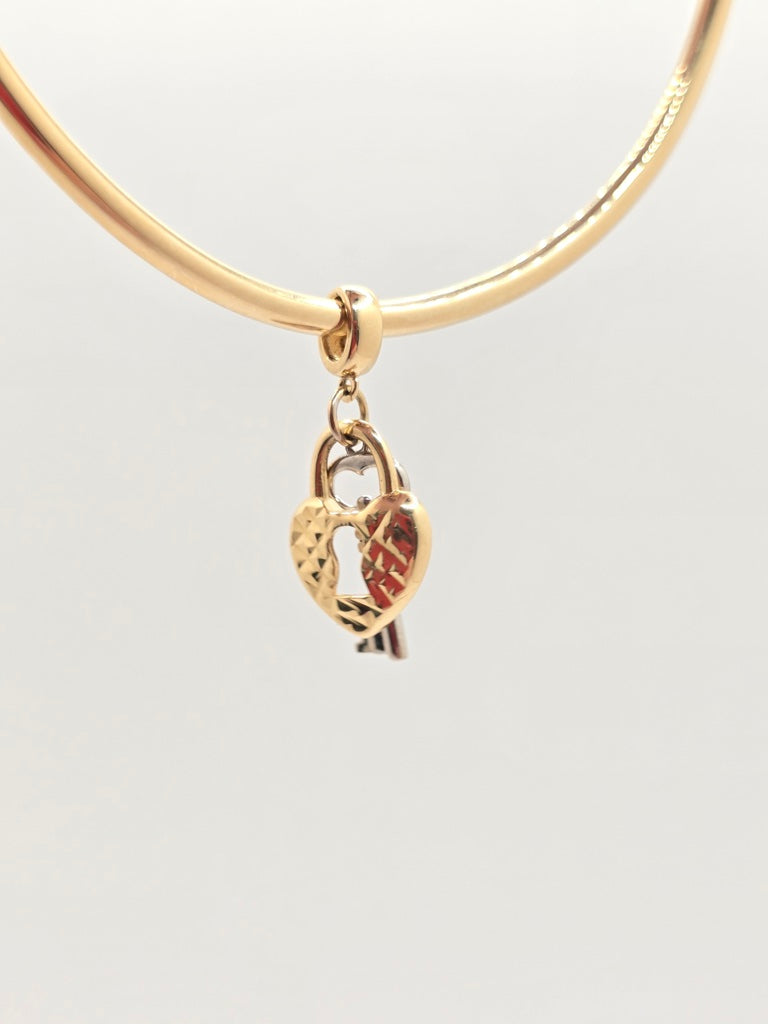 14KT HEART AND KEY CHARM Weight 1.5GR