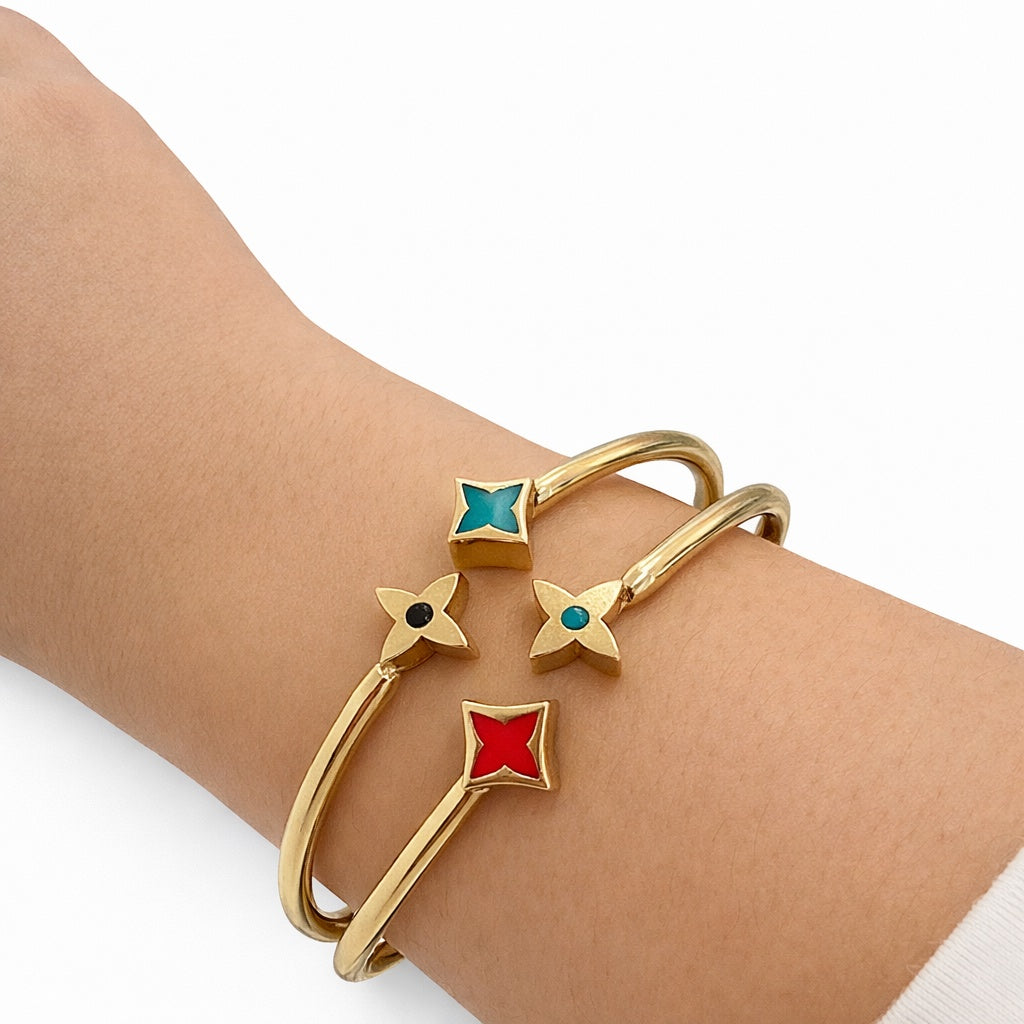 10KT BLUE AND RED STARS BANGLEWeight 13.3GR
