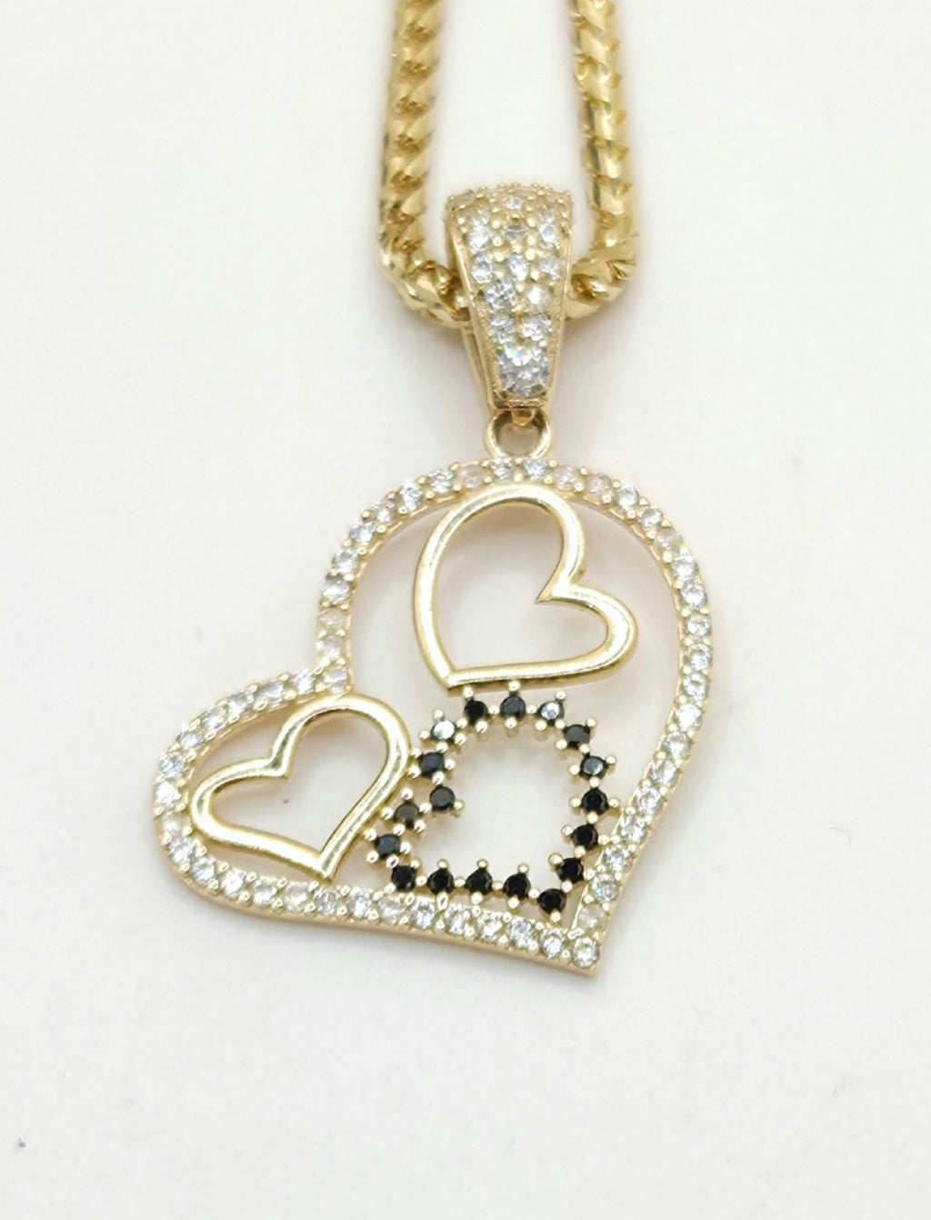 14KT CZ SILHOUETTE THREE HEARTS PENDANT  Weight 2GR
