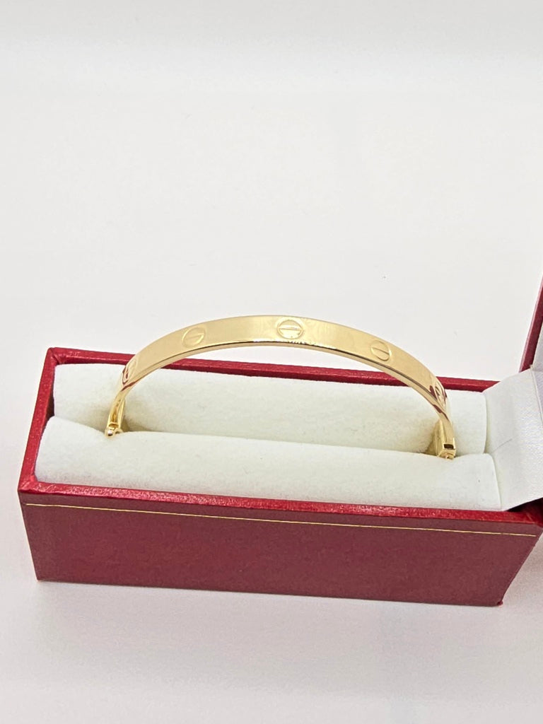 10KT YELLOW GOLD CARTI BANGLE Size 17 6MM Weight 8.8GR