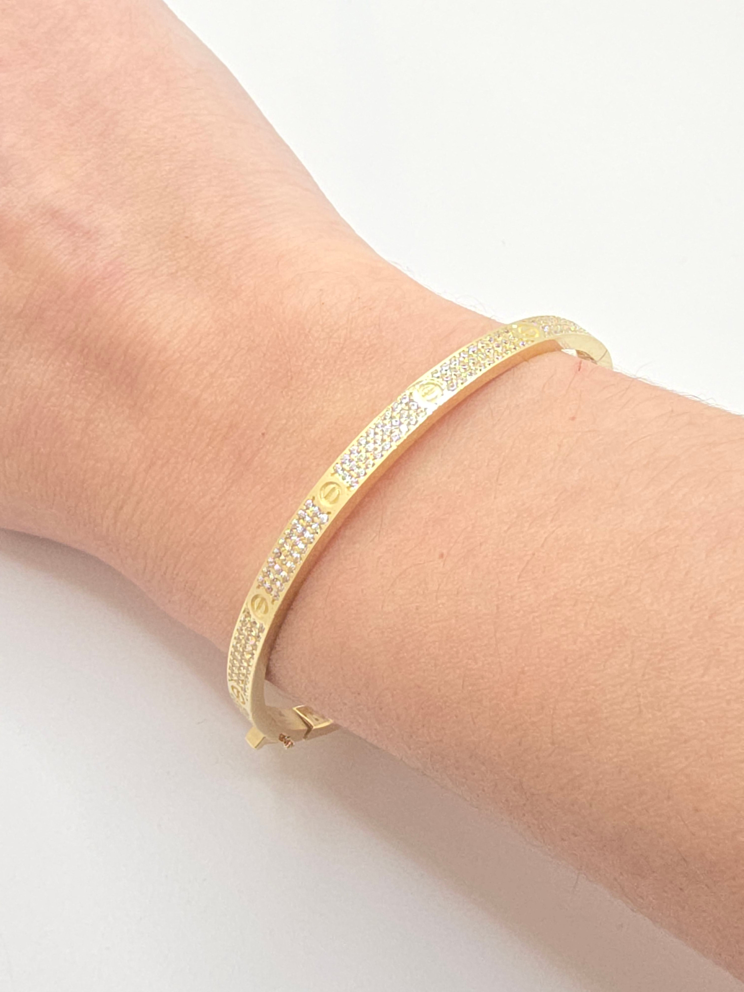 10KT YELLOW GOLD CARTI BANGLE WITH ZIRCONIA  Size 4.5MM Weight 8.2GR