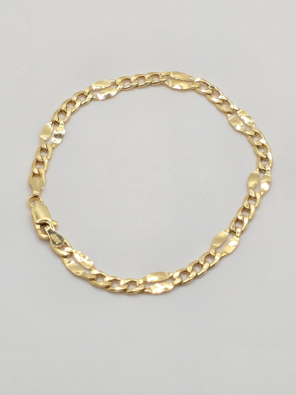 10KT CUBAN FIGARO RIVET BRACELET Size 7INCH 4MM Weight 1.9GR