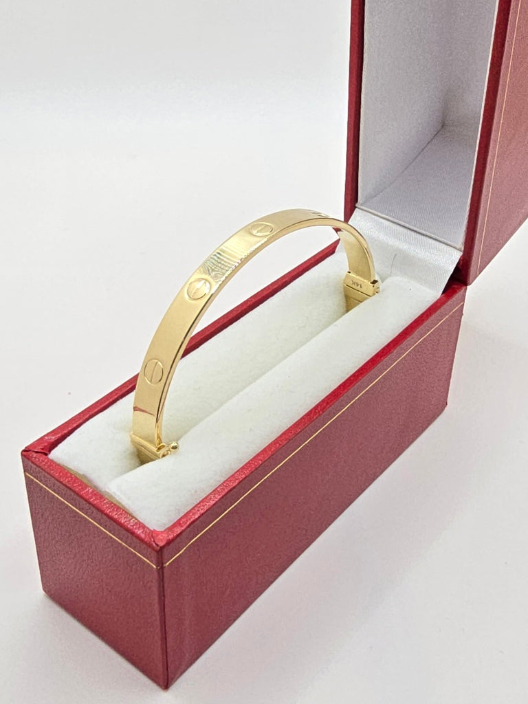 10KT YELLOW GOLD CARTI BANGLE Size 6MM Weight 8.6GR
