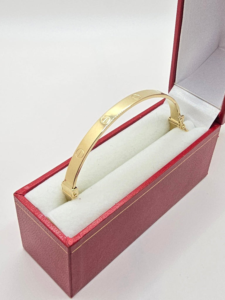 10KT YELLOW GOLD CARTI BANGLE Size 6MM Weight 8.5GR
