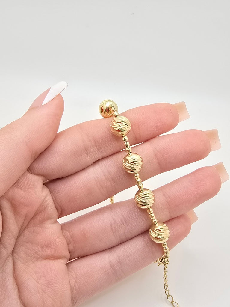 10KT YELLOW GOLD LARGE BEAD DIAMOND CUT BRACELET Size 7INCH Weight 7.8GR