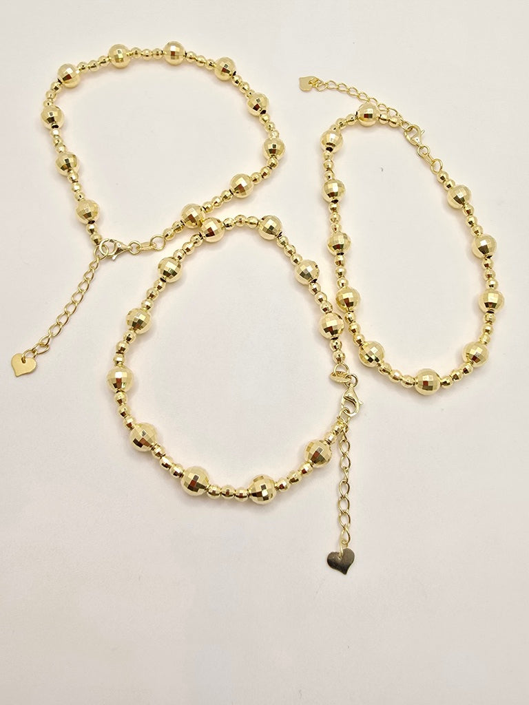 10KT YELLOW GOLD MEDIUM BEAD SQUARE CUT BRACELET  Size 7INCH Weight 4.7GR