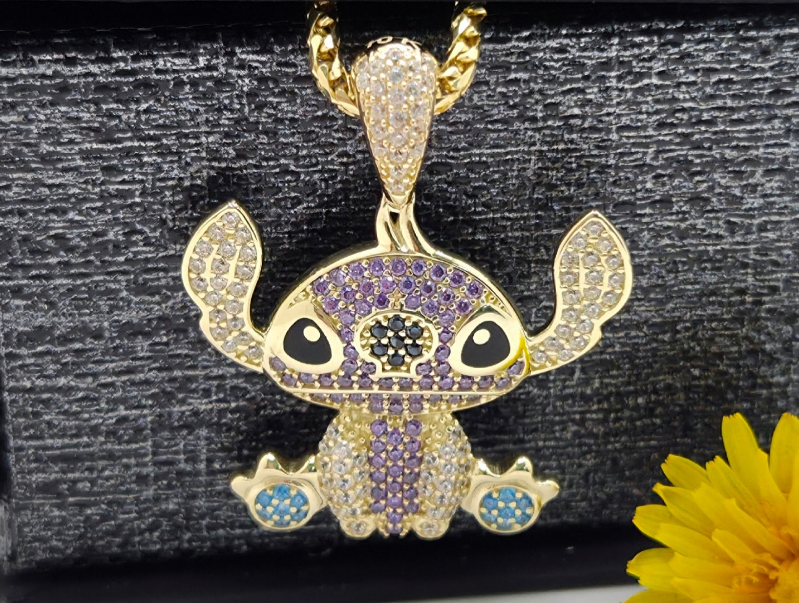 10KT PURPLE CZ STITCH PENDANT Weight 4.4GR
