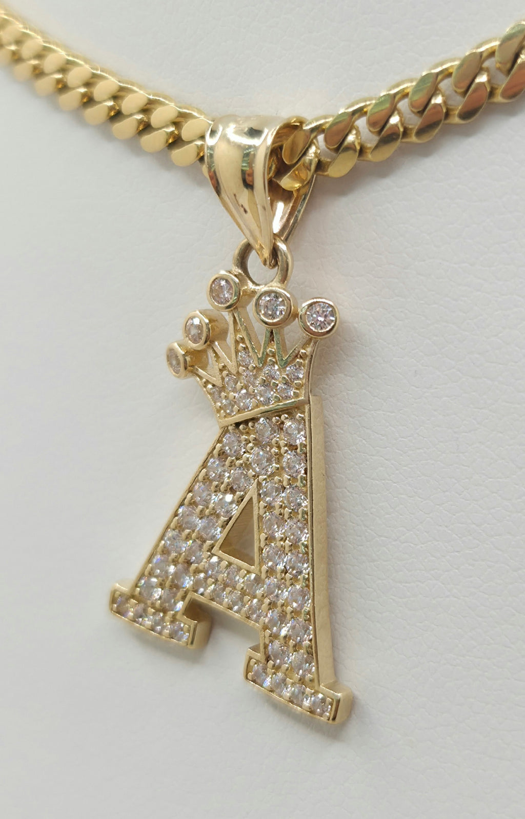 14KT crowned letter A pendant Size 17.2X25MM Weight 2.5 GRS