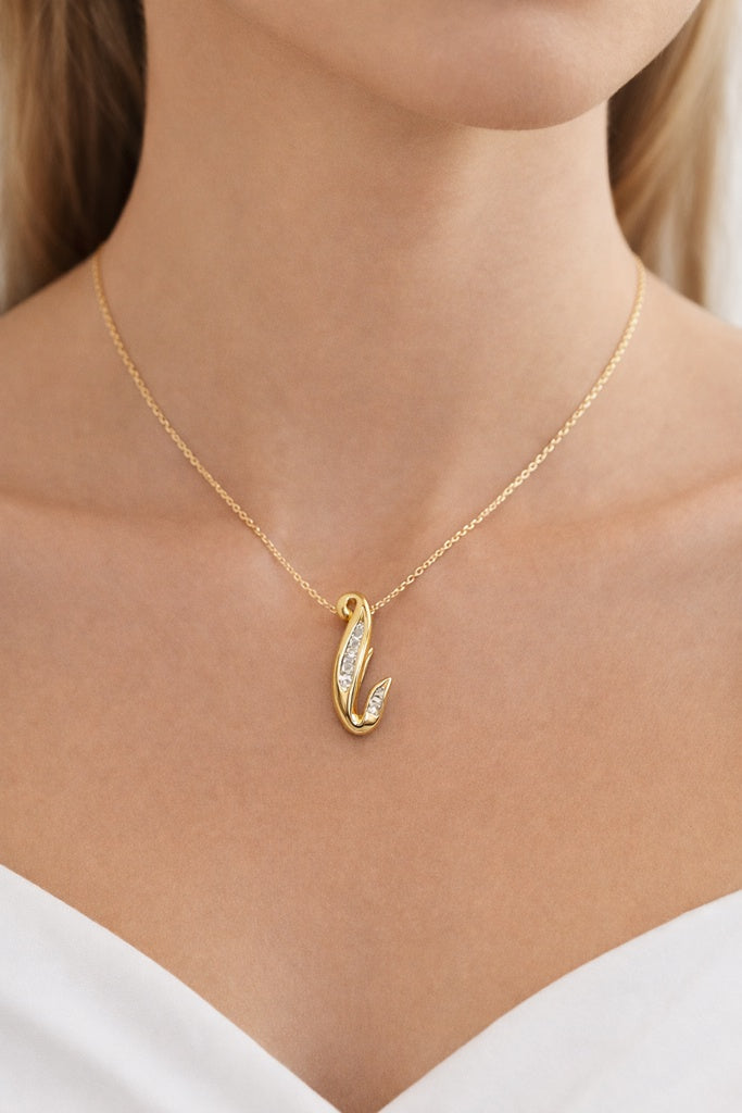 10KT DELICATE S SHAPE DIAMOND PENDANT Weigth 1.2GR